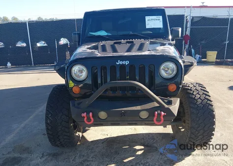 2008 Jeep Wrangler Unlimited Rubicon из США, поврежденный, VIN 1J4GA69138L614197